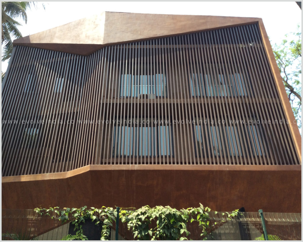 The facade of a house finished using rust concrete finish