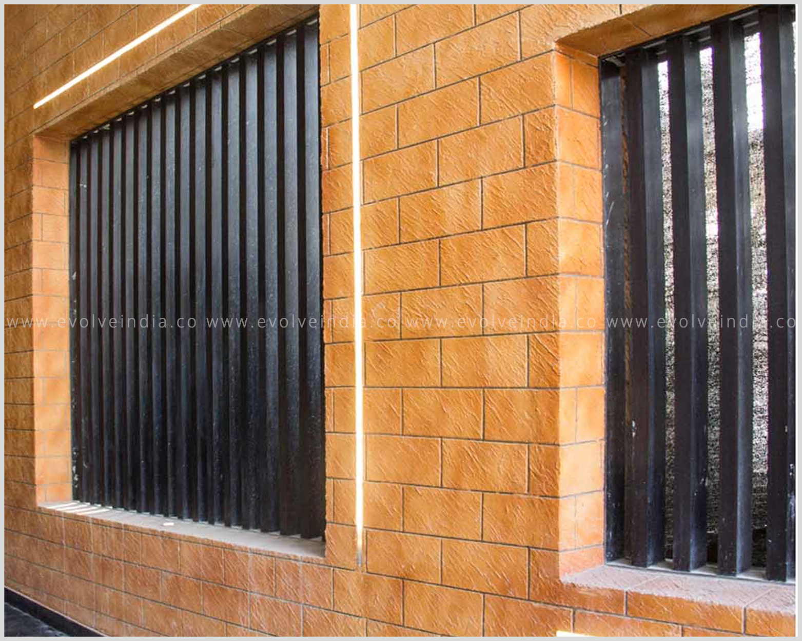Textured concrete finish facade developed by Evolve India