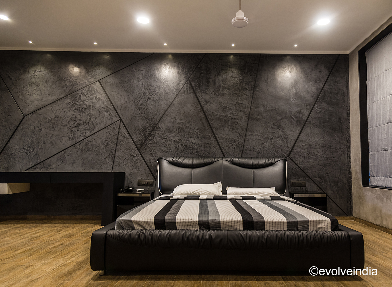 Door Designs By Evolve India Accefnt wall designed by Evolve India using decorative concrete and liquid metal finish