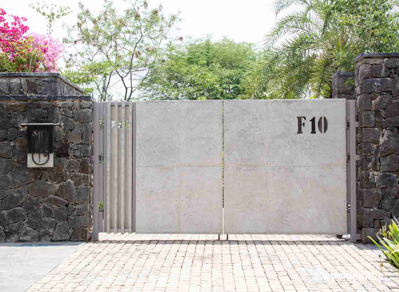 Exterior Design Exterior Wall Texture Design of A Residential Space done by Evolve India using decorative concrete finishes