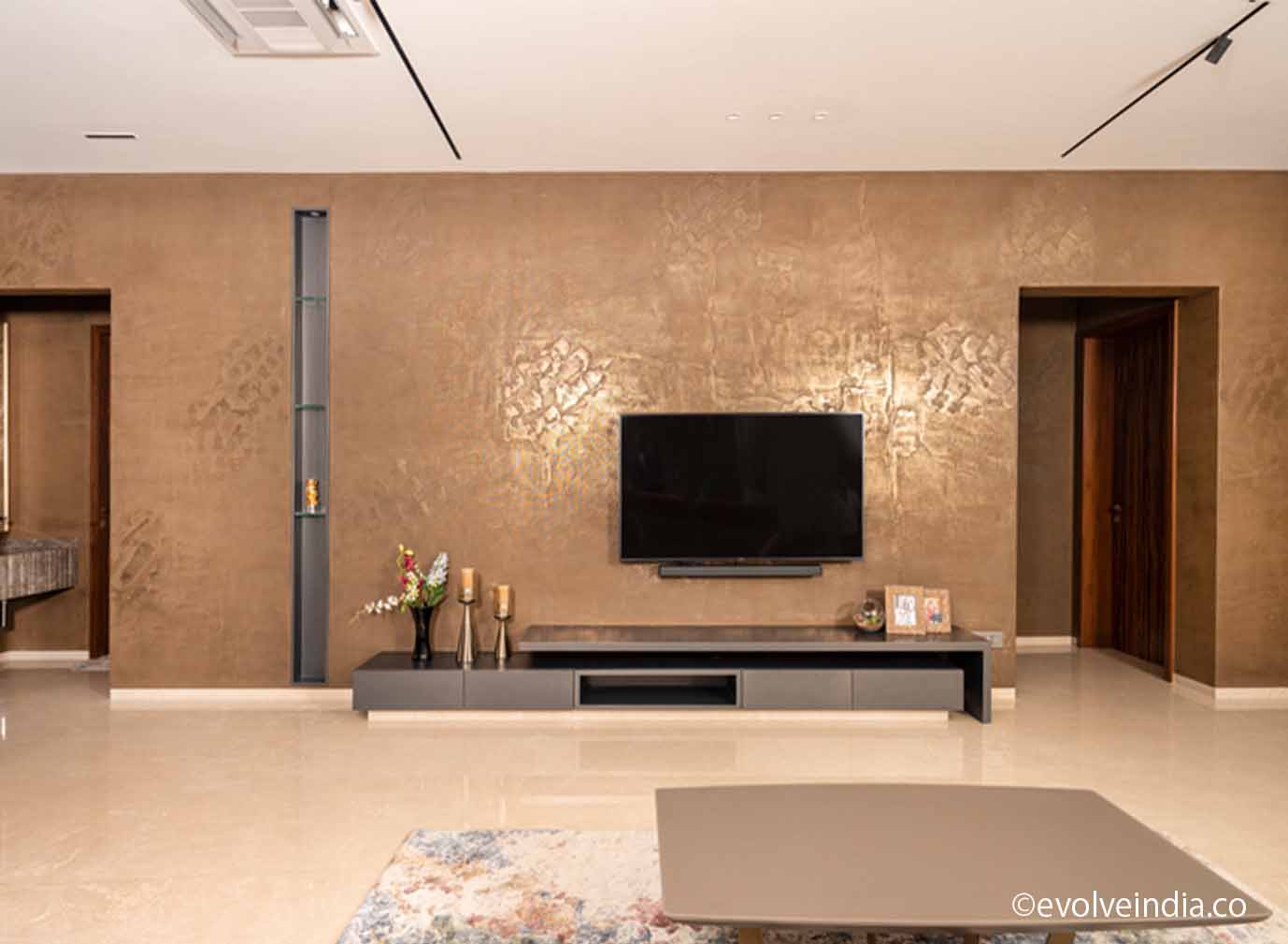 Project Work by Evolve India Accent wall designed using liquid metal bronze finish by Evolve India