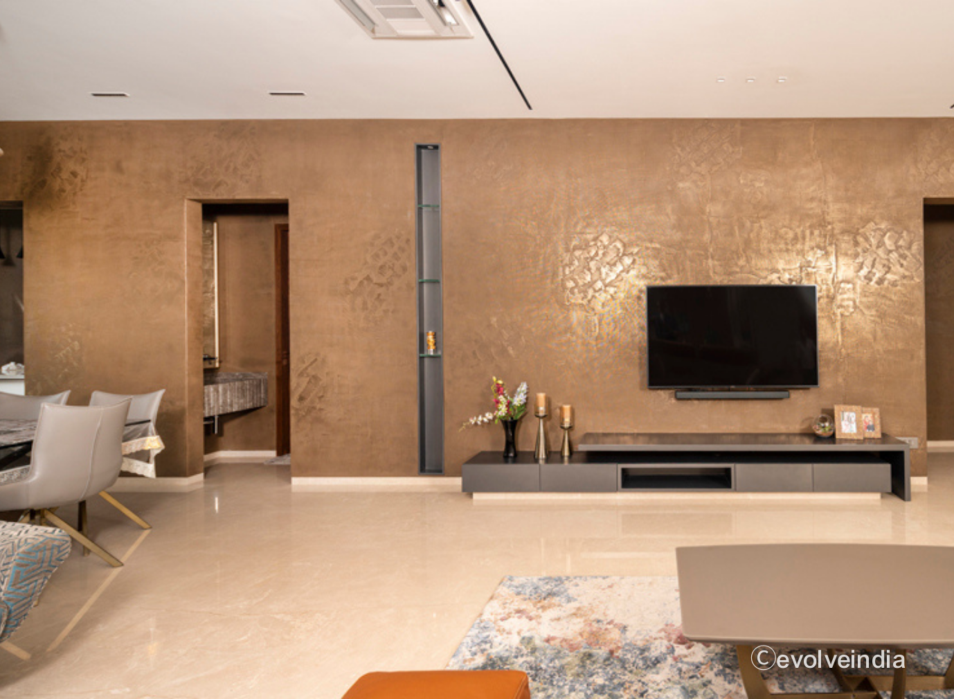 Liquid Metal Bronze Accent Wall Accent wall designed using liquid metal bronze finish by Evolve India