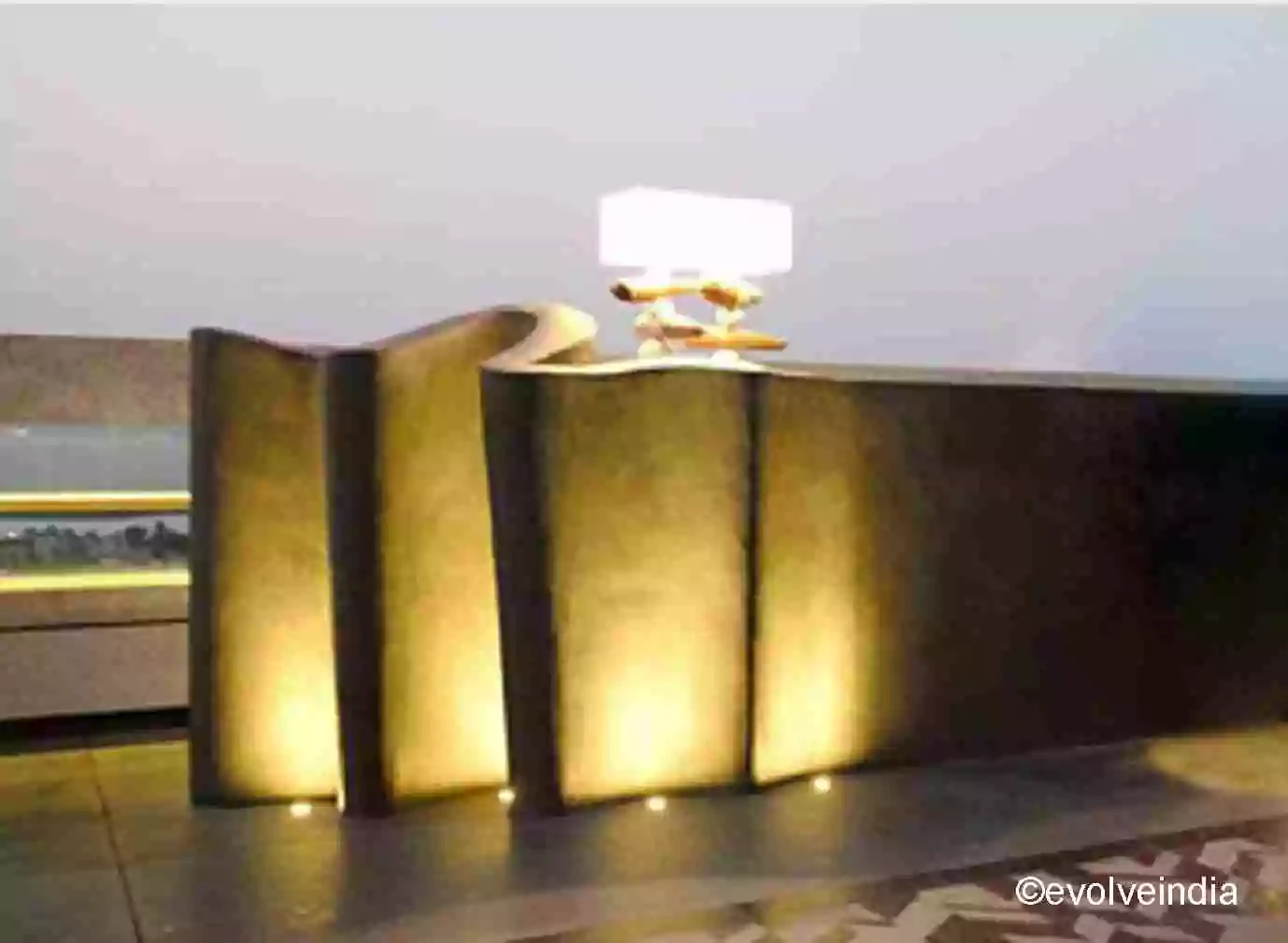 Rooftop bar table designed using copper patina finish
