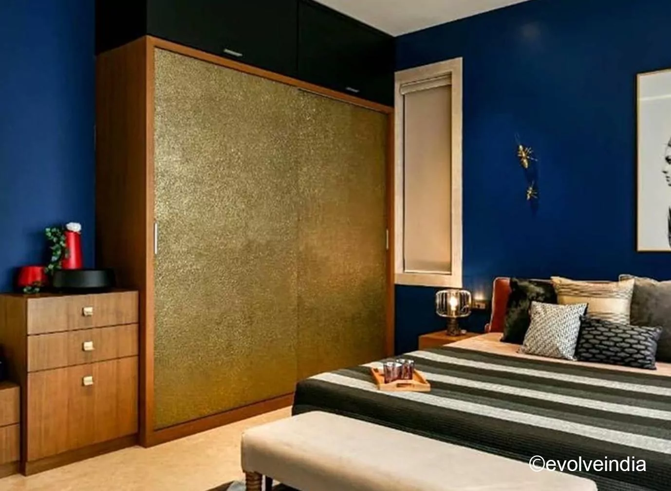 Bespoke Project Facade of wardrobe designed by Evolve India using liquid metal brass finish.