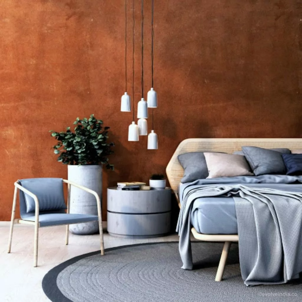 An Earthy Bed Backdrop Designed Using Corten Steel a.k.a Rust Textured Finishes by Evolve India