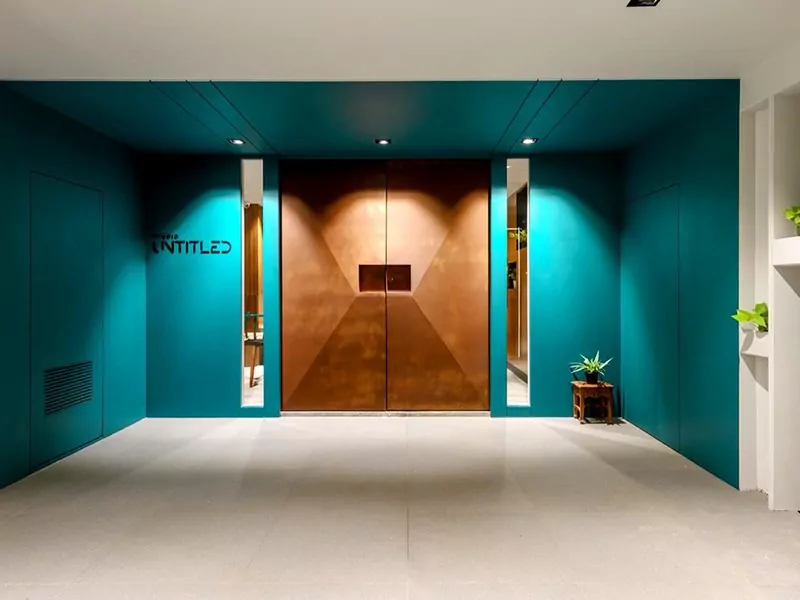 Modern door design by Evolve India, finished using rust liquid metal coating